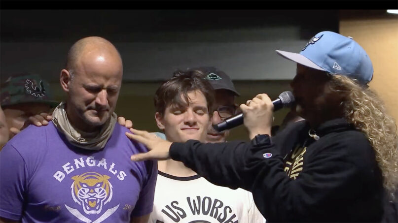 Timothy Teepell, Thomas Teepell, and Sean Feucht. Teepell and son Timmy being prayed over by Feucht.