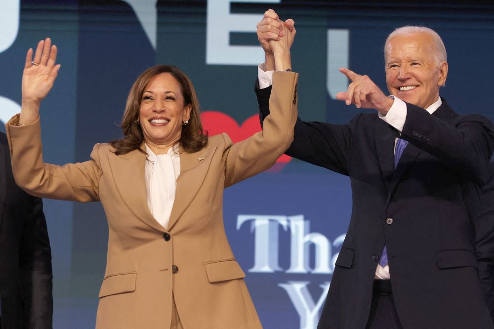 U.S. President Joe Biden and Democratic presidential candidate and U.S. Vice President Kamala Harris gesture during the Democratic National Convention. U.S. President Joe Biden and Democratic presidential candidate and U.S. Vice President Kamala Harris gesture during the Democratic National Convention.