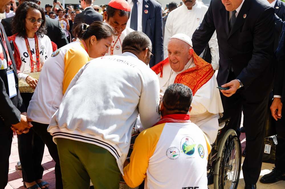 Pope Francis, Timor-Leste, Sept. 11, 2024. Francis in wheelchair greets people.