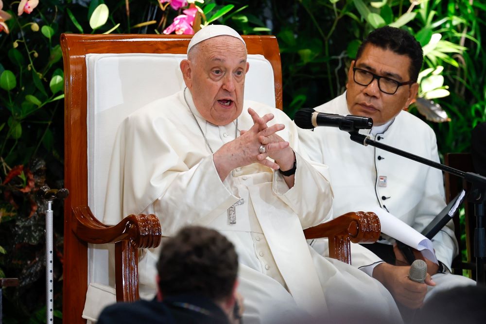 Pope Francis gestures as he talks to young people in Jakarta, Indonesia, Sept. 4. Pope Francis gestures as he talks to young people in Jakarta, Indonesia, Sept. 4.