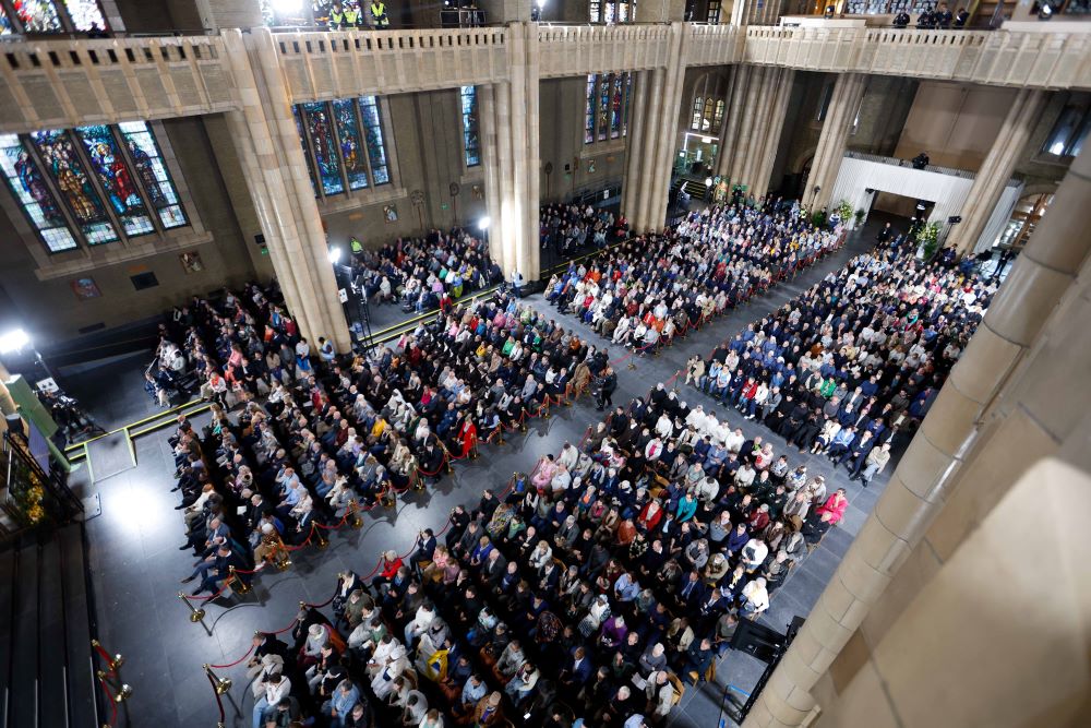 Some 2,600 people gather in the Basilica of the Sacred Heart for a meeting with Pope Francis in Brussels Sept. 28. Some 2,600 people gather in the Basilica of the Sacred Heart for a meeting with Pope Francis in Brussels Sept. 28.