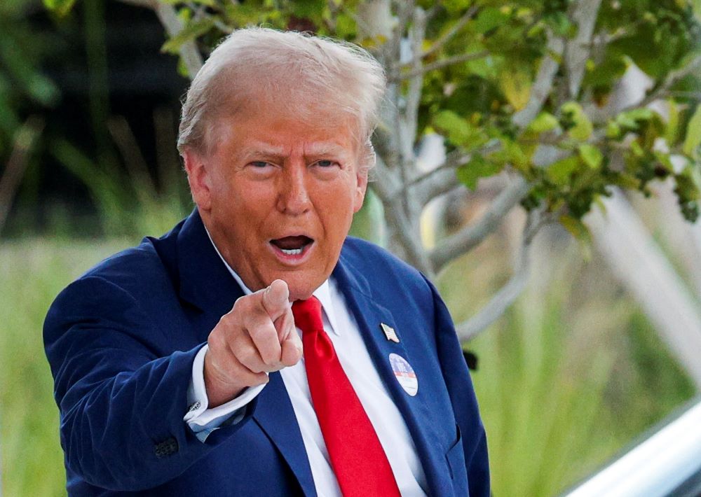Trump points finger. Trump points finger.