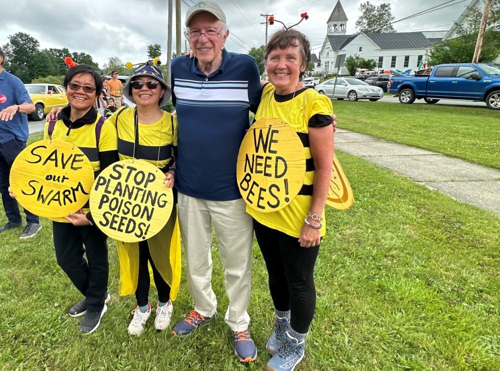 Sisters of the Earth community members pose with U.S. Sen. Bernie Sanders of Vermont at a 2024 Fourth of July parade in Greensboro, Vermont. Sisters of the Earth community members pose with U.S. Sen. Bernie Sanders of Vermont at a 2024 Fourth of July parade in Greensboro, Vermont.