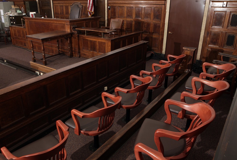 Courtroom file. Chairs and stands in empty courtoom.