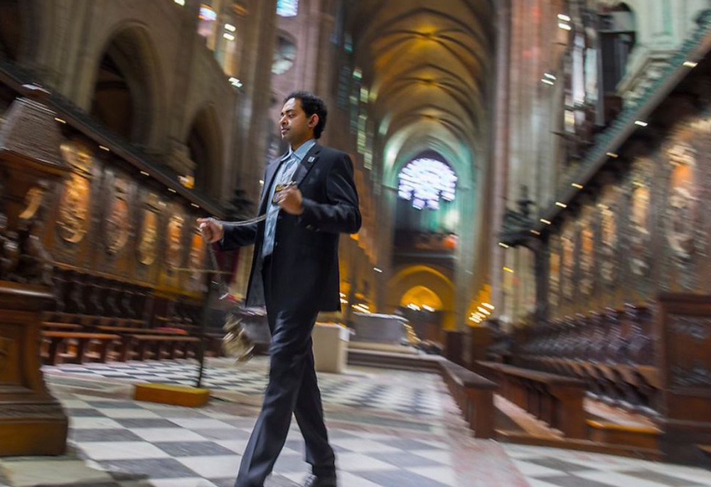 Patrick Kollannur is pictured inside Notre Dame Cathedral. He served as sacristan there from 2011-2019. (Courtesy of Patrick Kollannur)