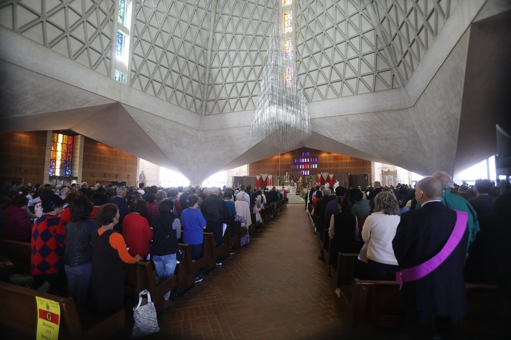 People at Mass at Cathedral of St. Mary of the Assumption in San Francisco, May 19, 2024. Interior of Cathedral filled with people.