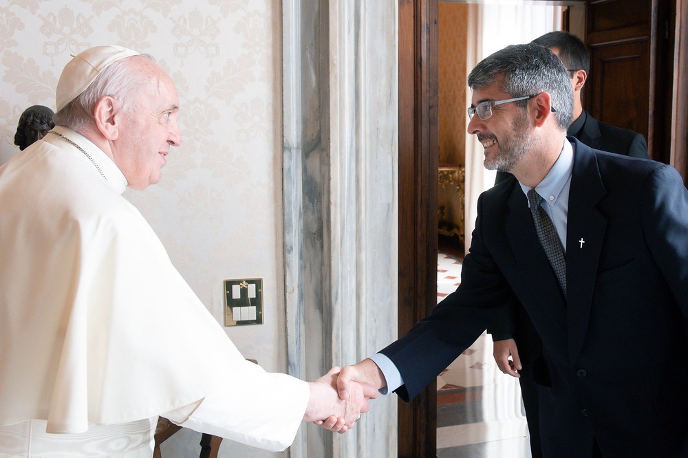 Pope Francis and José David Correa, Vatican City, Oct. 20, 2021. The pope shown shaking Correa's hand.