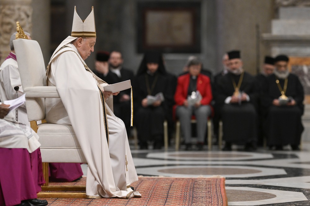 Pope Francis, ecumenical prayer service marking end of the Week of Prayer for Christian Unity, St. Paul Outside the Walls, Jan. 25. 2025. Francis vested and wearing mitre shown in profile sitting on white chair.