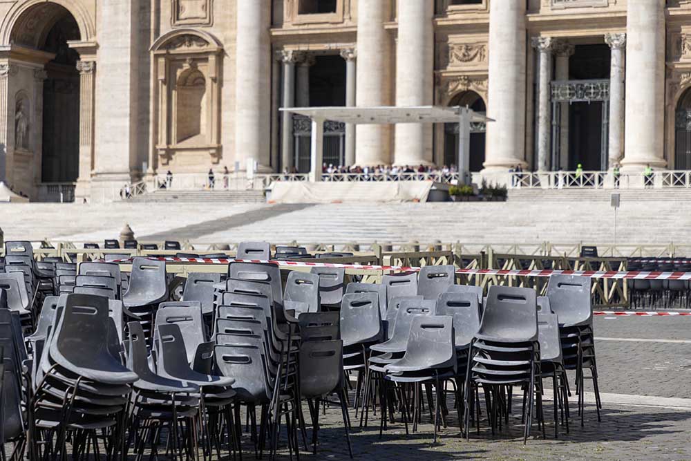 A cluster of stacked chairs is seen in St. Peter's Square at the Vatican March 26, 2025. Pope Francis' general audience, to be held in the square, was suspended due to his ongoing recovery from pulmonary infections. (CNS/Pablo Esparza)