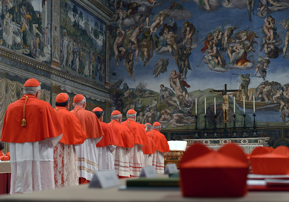 Cardinals from around the world line up in the Vatican's Sistine Chapel March 12, 2013, to take their oaths at the beginning of the conclave to elect a successor to Pope Benedict XVI. The following day, on the fifth ballot, they elected Cardinal Jorge Mario Bergoglio of Buenos Aires, Argentina, who chose the name Francis. (CNS/Vatican Media)