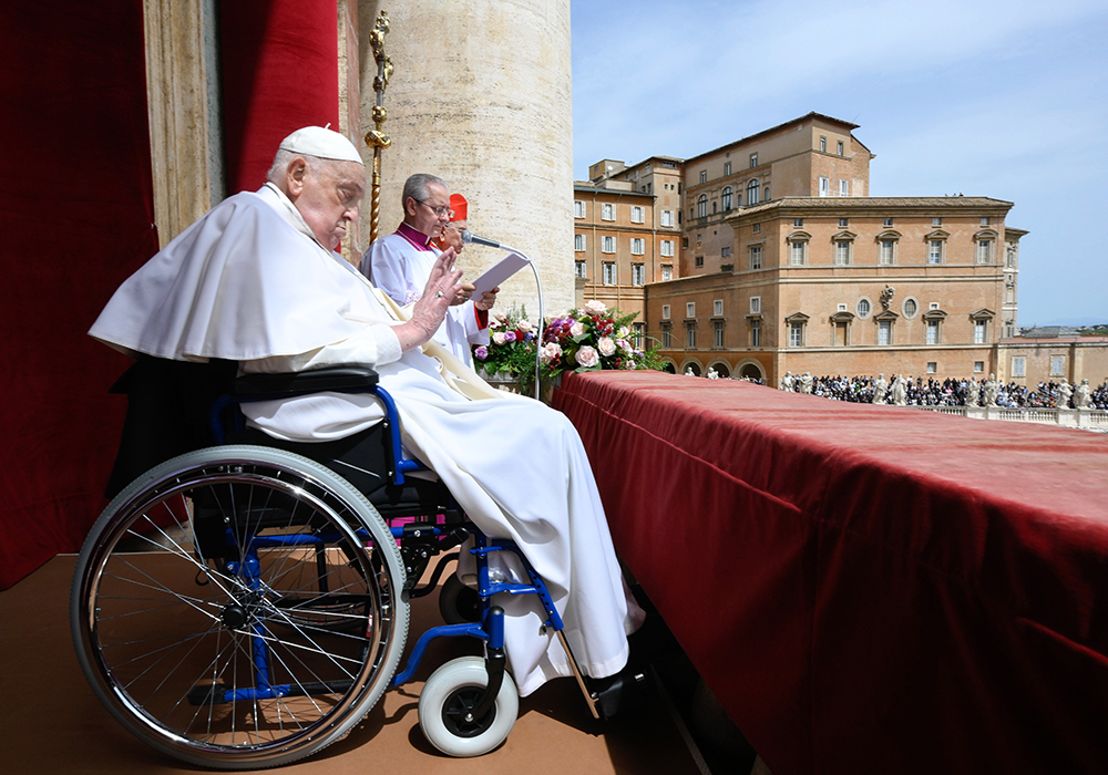 Pope Francis appears on the central balcony of St. Peter’s Basilica to deliver his Easter blessing "urbi et orbi" (to the city and the world) at the Vatican April 20, 2025. (CNS/Vatican Media)
