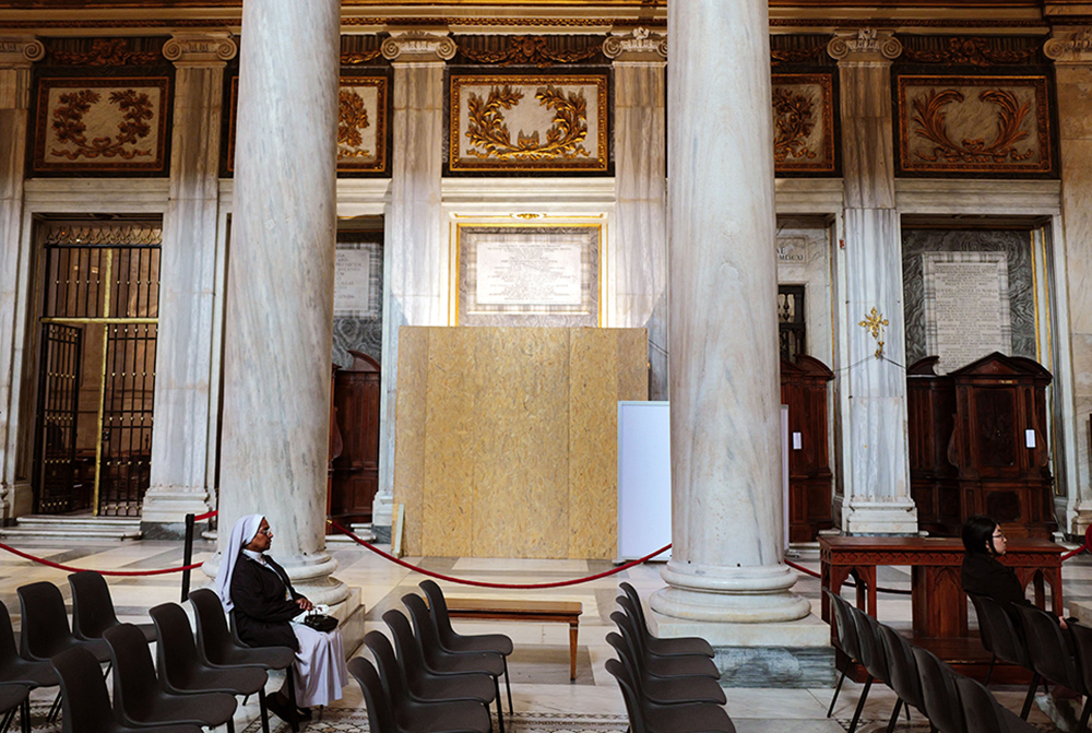 A nun prays near the site for the tomb of Pope Francis at Rome's Basilica of St. Mary Major April 25, 2025, where the pope is to be buried April 26. Pope Francis, formerly Argentine Cardinal Jorge Mario Bergoglio, died April 21 at age 88. (OSV News/Reuters/Kai Pfaffenbach)