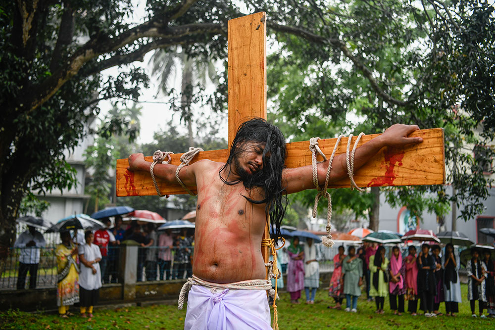 In a Way of the Cross reenactment, Jesus is crucified under the open sky, in front of Dinajpur Cathedral in Bangladesh on April 18, 2025. (Piyas Biswas)