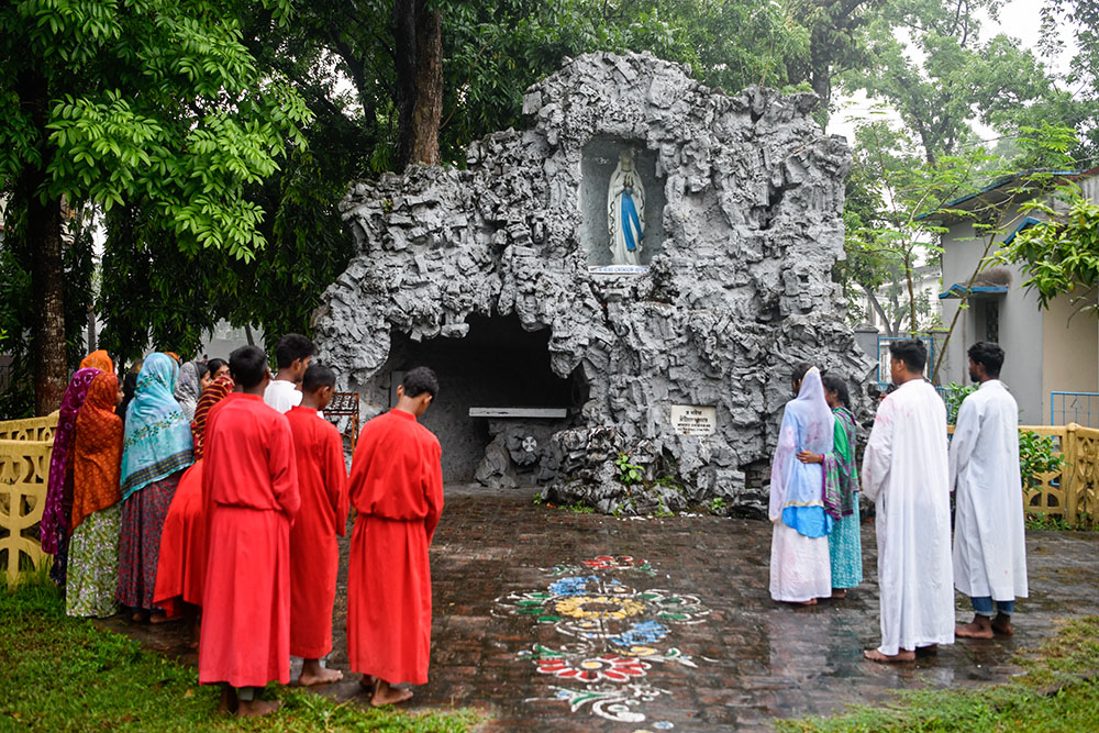 Jesus is laid to rest in the tomb during the Way of the Cross at Dinajpur Cathedral in Bangladesh on April 18, 2025. (Piyas Biswas)