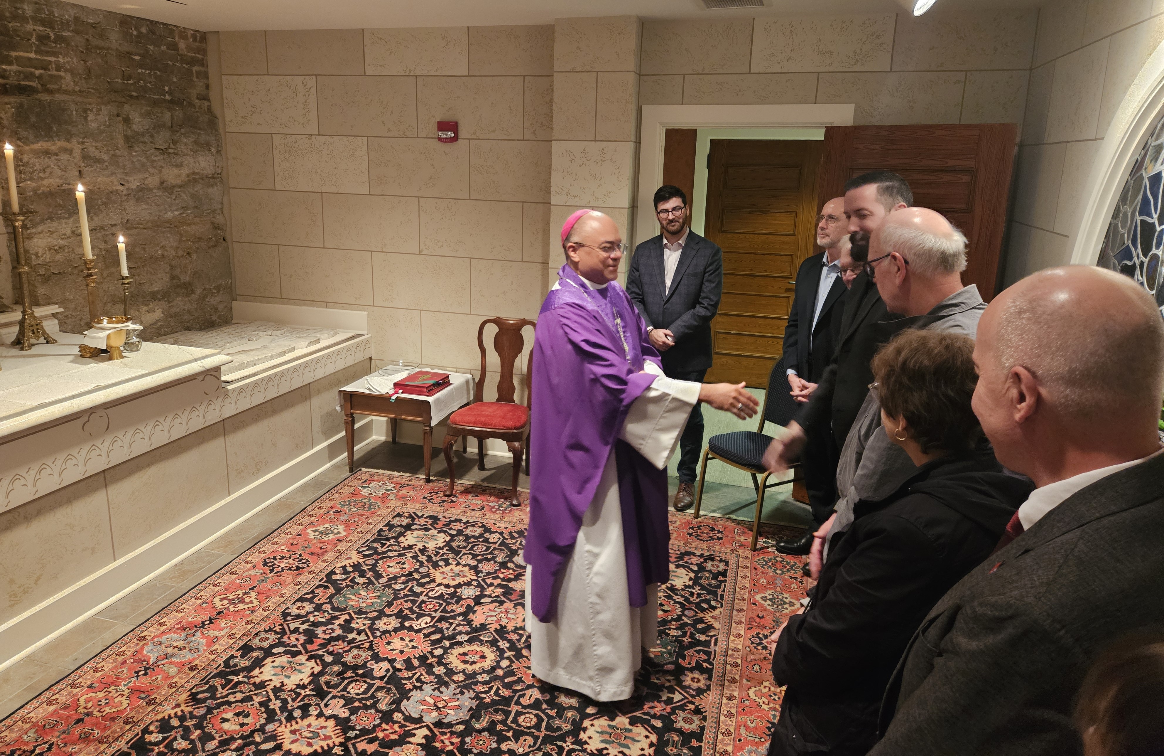 Louisville Archbishop Shelton Fabre greets attendees at The Way Forward after Mass