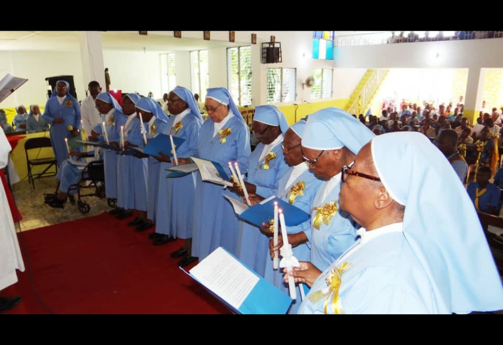 Members of the congregation of the Little Sisters of St. Thérèse of the Child Jesus are pictured during a 2021 Mass in Port-au-Prince, Haiti. Two of the congregation's members, Sr. Evanette Onesaire and Sr. Jeanne Siliane Voltaire, were killed March 31. (OSV News/Courtesy Aid to the Church in Need)