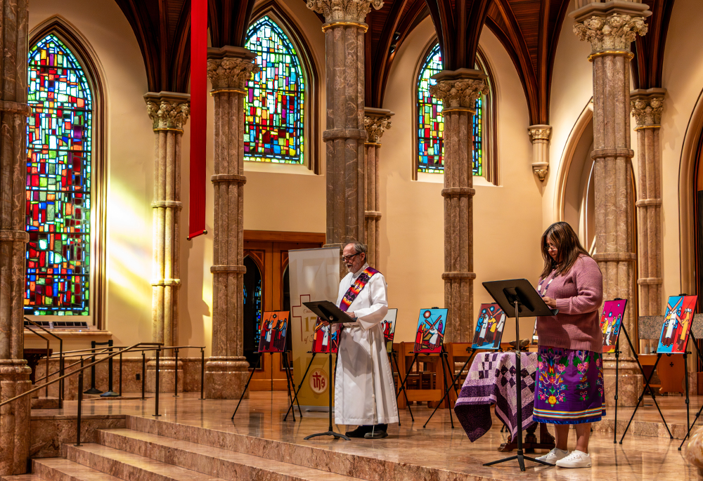 Jody Roy, member of the Ojibwe Tribe, and Deacon Bill Frere lead the stations in Holy Name Cathedral in Chicago. Prayers for the devotion were drawn from the U.S. bishops' document on pastoral ministry to Indigenous Catholics, which was approved in June 2024. (Courtesy of Jade Roy)