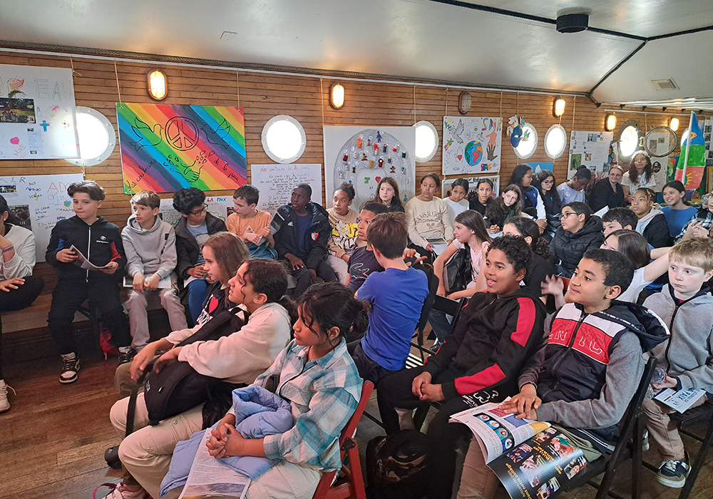 Youths gather for a lesson on peacemaking led by Pax Christi France in May 2023. (Courtesy of Pax Christi France)