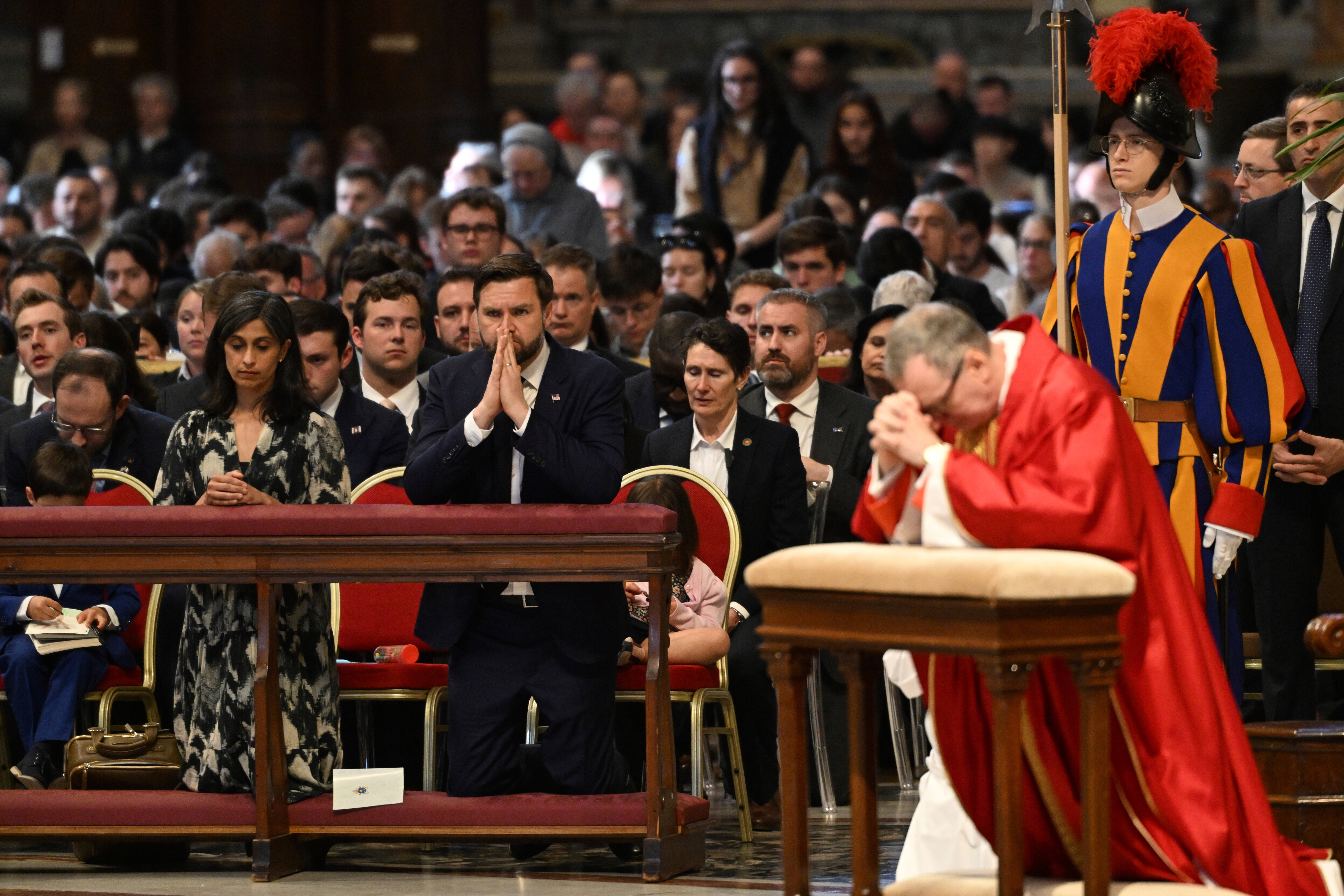 Vance at Good Friday services JD Vance attends the Good Friday mass in St. Peter's Basilica at the Vatican, Friday, April 18, 2025. (Kenny Holston/The New York Times via AP, Pool)