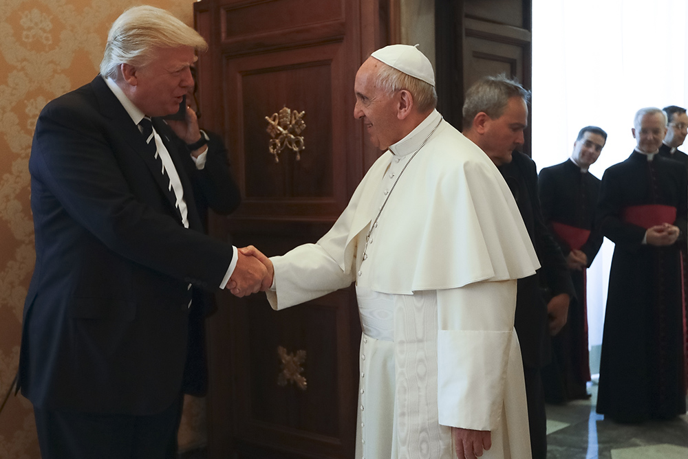 Pope Francis meets with President Donald Trump, left, on the occasion of their private audience, at the Vatican, May 24, 2017. (AP Photo/Alessandra Tarantino, Pool, File)