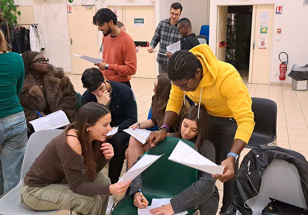 Young adults engage in an exercise focusing on the components of peacemaking in December 2024. (Courtesy of Pax Christi France)