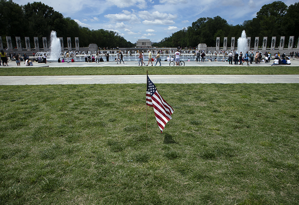 People are seen near the World War II Memorial in Washington during Memorial Day on May 31, 2021. (CNS/Tyler Orsburn)