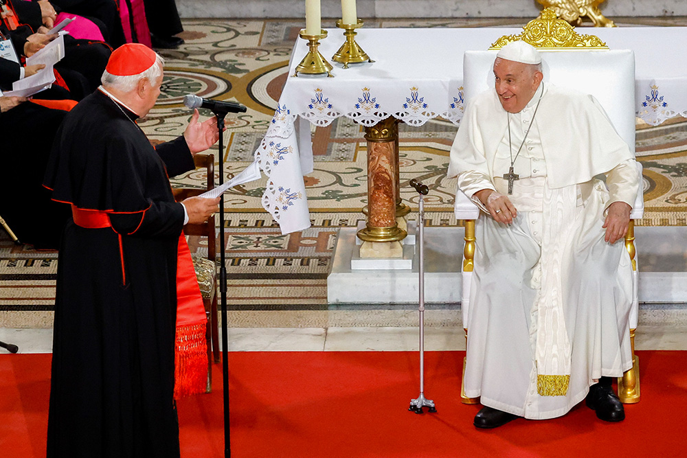 Pope Francis shares a smile with Cardinal Jean-Marc Aveline during a Marian prayer service with diocesan clergy at the Basilica Notre-Dame de la Garde in Marseille, France, Sept. 22, 2023. (CNS/Lola Gomez)