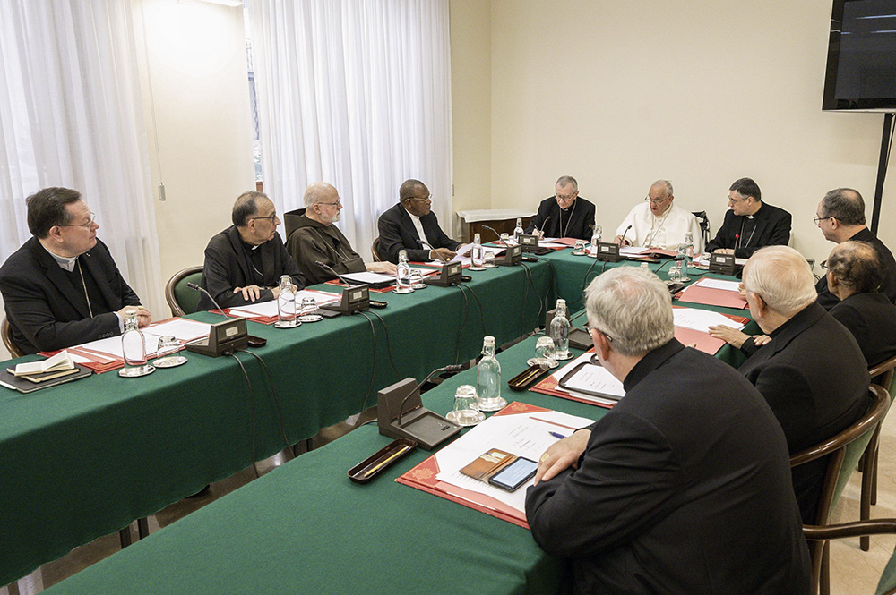 Pope Francis meets with the members of his Council of Cardinals, including Cardinal Gérald Lacroix of Quebec (left), at the Vatican on April 24, 2023. (CNS/Vatican Media)