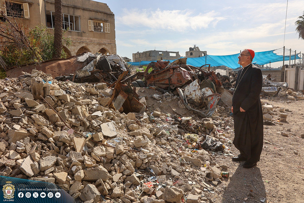 Cardinal Pierbattista Pizzaballa, Latin patriarch of Jerusalem, looks at the destruction on the streets of Gaza City Dec. 22, 2024. He made a pre-Christmas visit aiming to bring the joy of the season to the suffering Christian community in the Gaza Strip in the 14th month of Israel-Hamas war. (OSV News/Courtesy of Latin Patriarchate of Jerusalem)