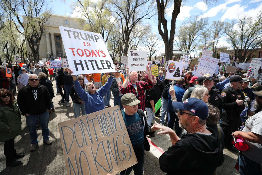 ARIZONA-TRUMP-PROTEST A protester confronts a counter-protester as a large crowd gathers outside the courthouse in Prescott, Ariz., April 5, 2025, to protest against U.S. President Donald Trump's administration. Opponents of Trump and billionaire Elon Musk rallied across the U.S. to protest the administration’s actions on government downsizing, the economy, human rights and other issues. (OSV News/Bob Roller)