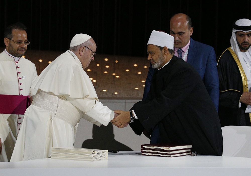 Pope Francis shakes hands with Sheik Ahmed al-Tayeb, grand imam of Egypt's Al-Azhar Mosque and University, during a document signing at an interreligious meeting at the Founder's Memorial in Abu Dhabi, United Arab Emirates, in this Feb. 4, 2019, file photo. Pope Francis, died April 21, 2025, at age 88. (CNS/Paul Haring)