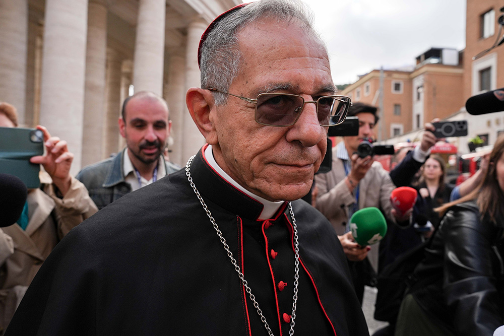 Cardinal Juan García Rodríguez of Havana, Cuba, approaches the Petriano entrance next to St. Peter’s Square to attend a general congregation meeting in the New Synod Hall at the Vatican April 25, 2025. (CNS/Lola Gomez)