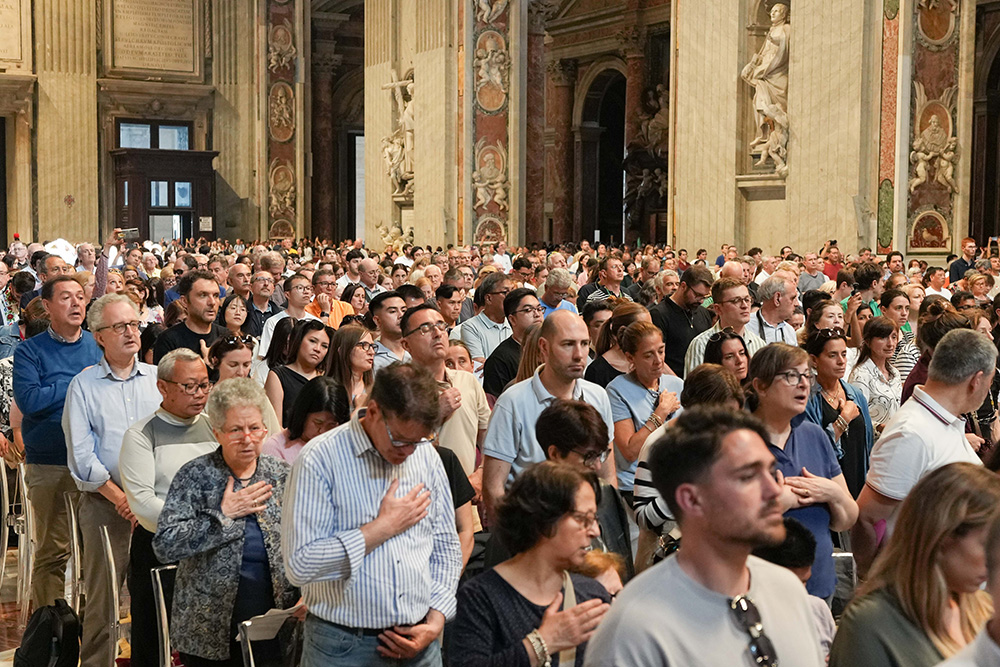 People pray during Mass on the seventh day of the "novendiali," nine days of mourning for Pope Francis, in St. Peter's Basilica at the Vatican May 2, 2025. (CNS/Lola Gomez)