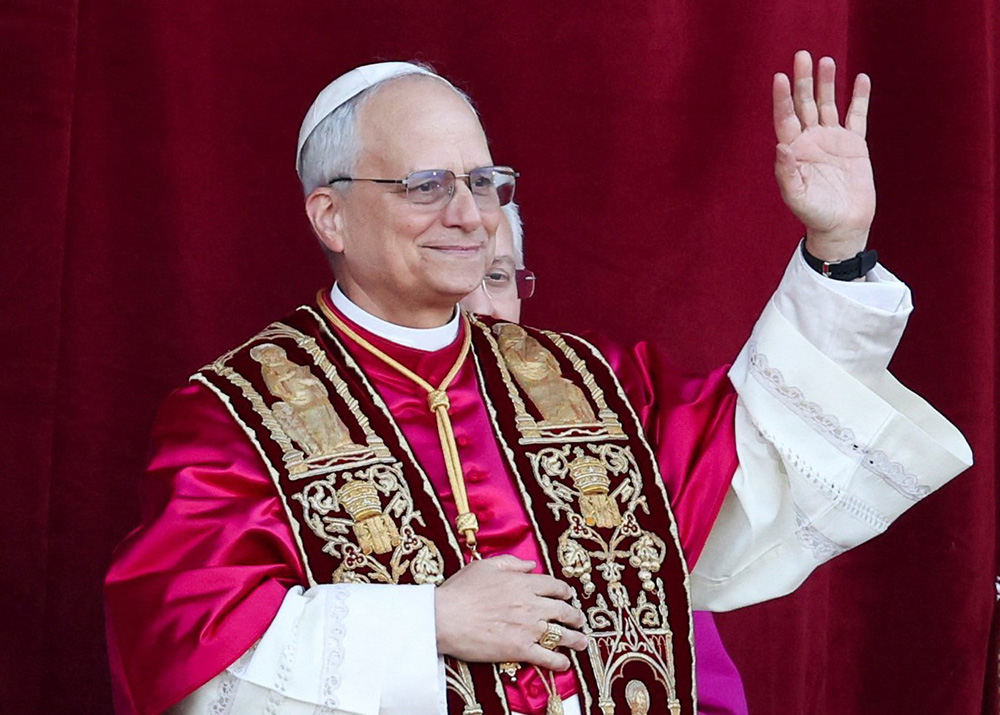 Cardinal Robert Francis Prevost, who has chosen the papal name Leo XIV, appears on the central balcony of St. Peter's Basilica at the Vatican May 8, 2025, following his election during the conclave. (OSV News/Reuters/Claudia Greco)