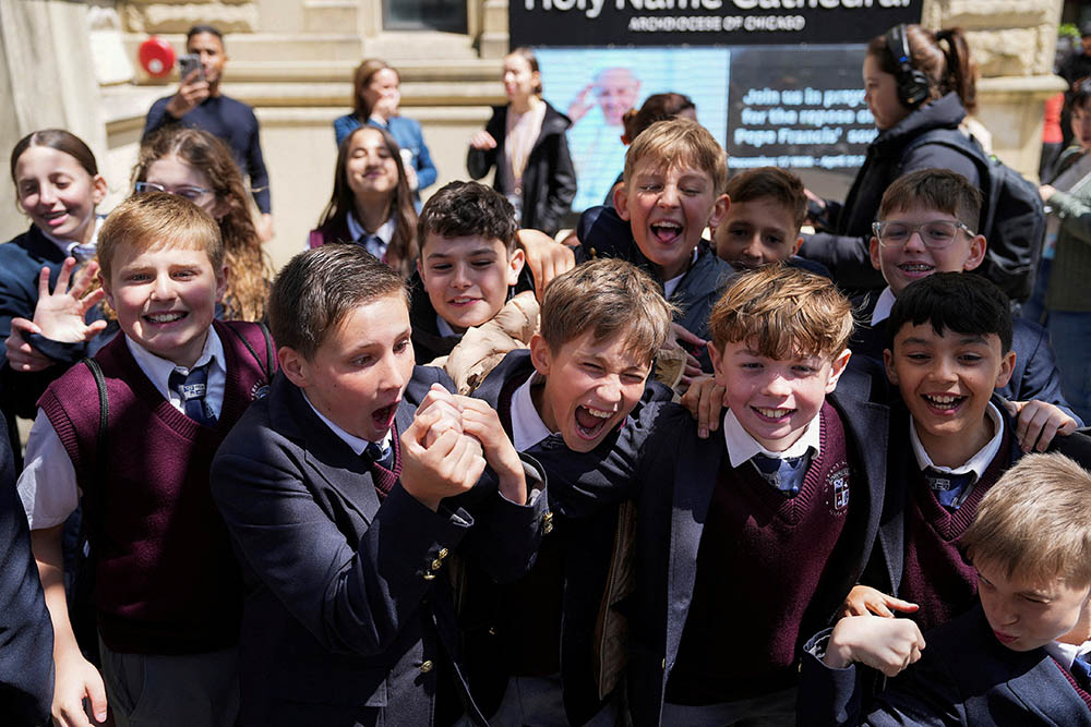 Students from Everest Academy in Lemont, Ill., cheer May 8, 2025, react after it was announced that Chicago-born Cardinal Robert Francis Prevost was elected as the next pope. He chose the papal name Leo XIV. (OSV News/Reuters/Vincent Alban)
