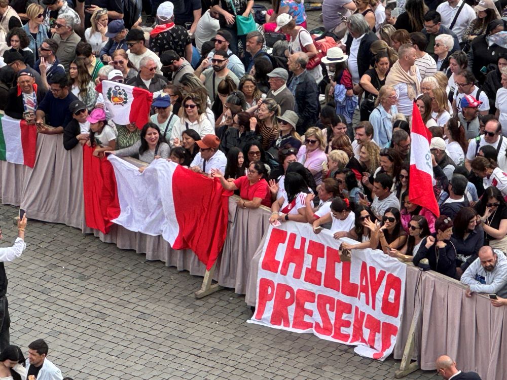 A group of Peruvians at St. Peter's Square waved a flag that said "Chiclayo presente," or "Chiclayo is here," referring to the Diocese of Chiclayo, Peru, where Pope Leo XIV served as priest and bishop, on May 11. (NCR photo/Rhina Guidos) A group of Peruvians at St. Peter's Square waved a flag that said "Chiclayo presente," or "Chiclayo is here," referring to the Diocese of Chiclayo, Peru, where Pope Leo XIV served as priest and bishop, on May 11. (NCR photo/Rhina Guidos)