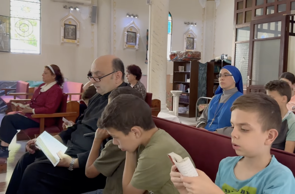 Fr. Gabriel Romanelli prays with children in Holy Family Parish in Gaza City in May 2025. From Oct. 7, 2023, until his death April 21, Pope Francis called the parish at the same time every night. (Courtesy of Gabriel Romanelli) Fr. Gabriel Romanelli prays with children in Holy Family Parish in Gaza City in May 2025. From Oct. 7, 2023, until his death April 21, Pope Francis called the parish at the same time every night. (Courtesy of Gabriel Romanelli)