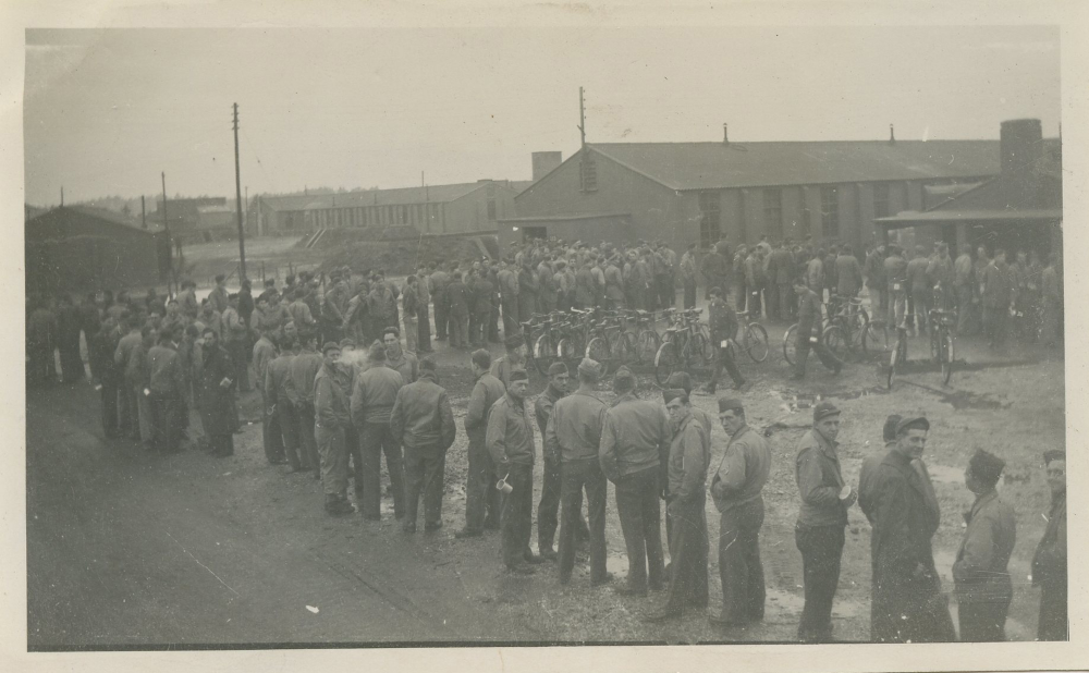American soldiers stand in line waiting for food in December 1943 in England. American soldiers stand in line waiting for food in December 1943 in England.