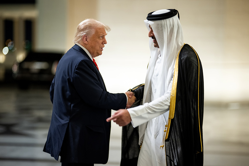 President Donald Trump is greeted by Amir of Qatar Sheikh Tamin bin Hamad Al Thani at Lusail Palace in Doha, Qatar on May 14, 2025, to attend an official State Dinner. (Official White House Photo/Daniel Torok)