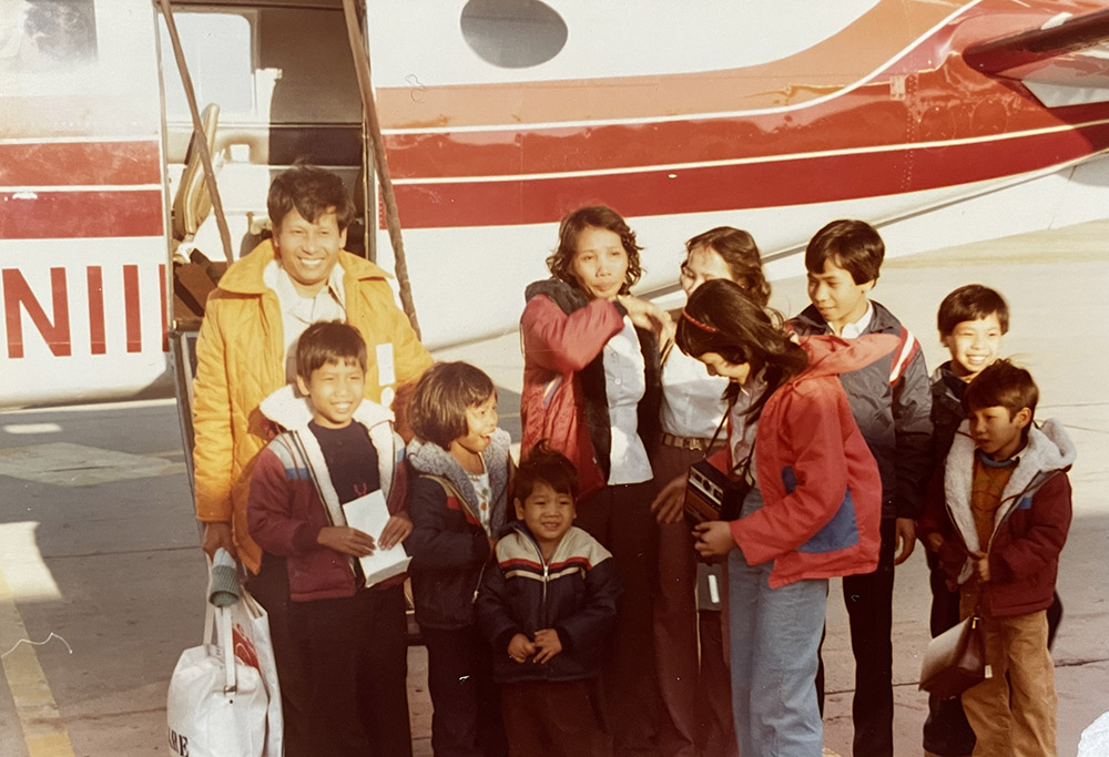Michael Pham (third from right) and his family in April 1983 when the Pham family was reunited in Mankato, Minnesota, for the first time in two-and-a-half years (Courtesy of San Diego Diocese)