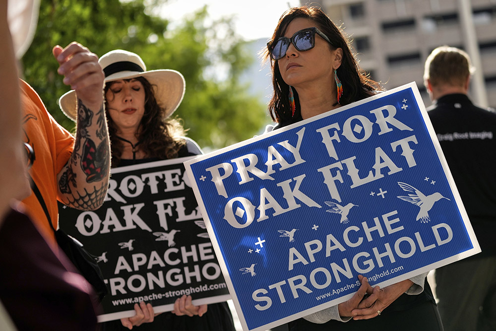 Apaches and others who want to halt a massive copper mining project on federal land in Arizona gather outside the U.S. District Court, May 7, 2025, in Phoenix. (AP/Matt York, File)
