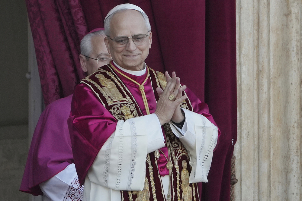 Newly elected Pope Leo XIV appears at the balcony of St. Peter's Basilica at the Vatican, May 8, 2025. (AP Photo/Markus Schreiber)