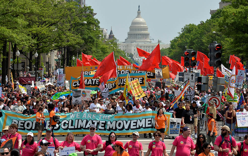 Demonstrators join the People's Climate March in Washington to protest President Donald Trump's stance on the environment April 29, 2017. (CNS/Reuters/Mike Theiler)