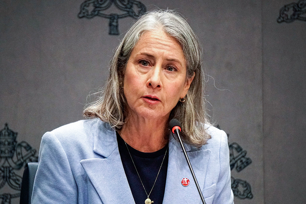 Krisanne Vaillancourt Murphy, executive director of Catholic Mobilizing Network, speaks at a news conference presenting Pope Francis' World Peace Day message at the Vatican Dec. 12, 2024. (CNS/Carol Glatz)