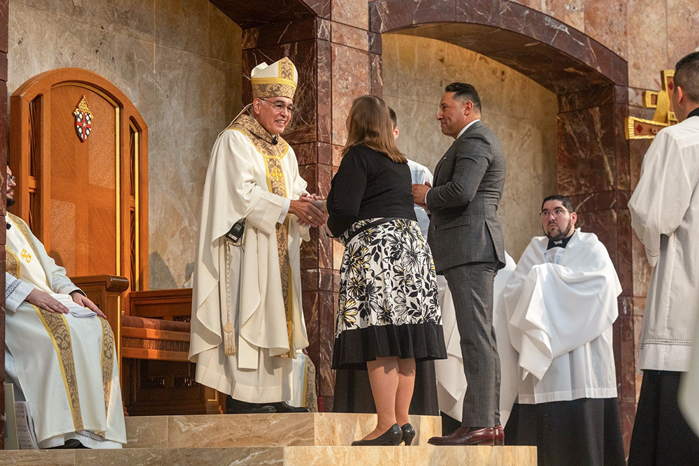 Galveston-Houston Archbishop Joe Vásquez greets a man and woman during his installation Mass at the Co-Cathedral of the Sacred Heart in Houston March 25, 2025, the feast of the Annunciation. (OSV News/Galveston-Houston Facebook page)