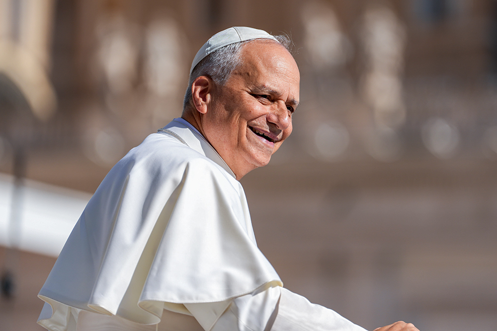 Pope Leo XIV greets visitors and pilgrims from the popemobile as he rides around St. Peter's Square at the Vatican before his weekly general audience June 25, 2025. (CNS/Lola Gomez)