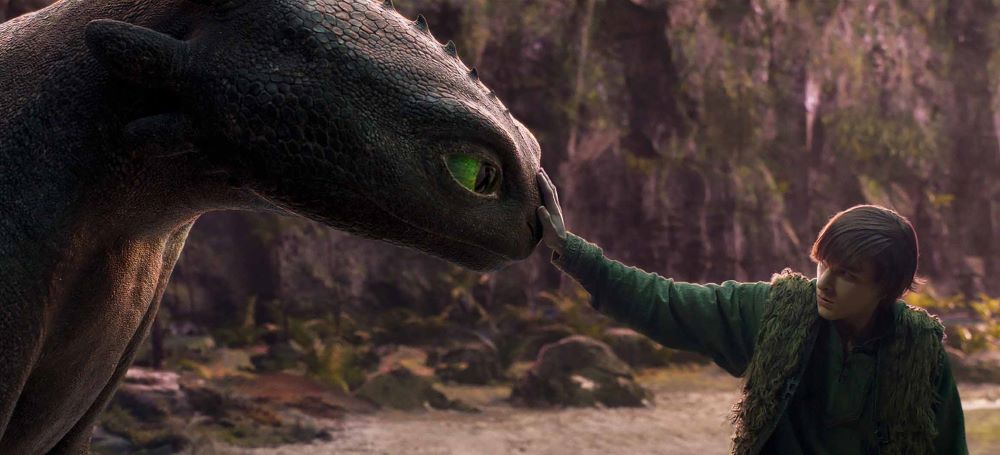 Movie scene of boy with dragon Movie scene of boy with dragon