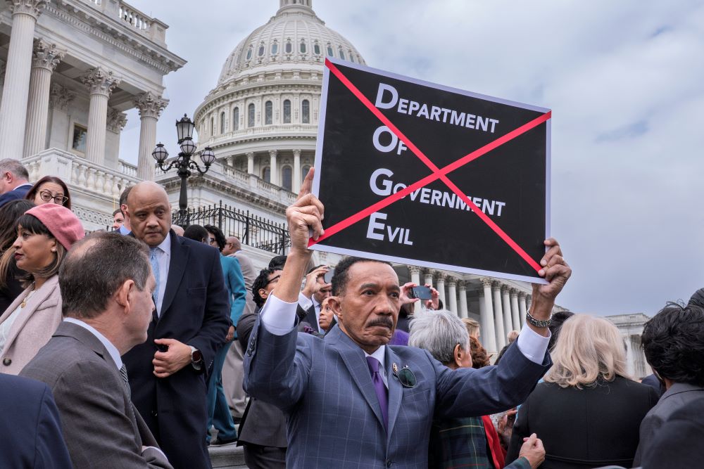 Rep. Kweisi Mfume, Democrat of Maryland, protests against DOGE, the Department of Government Efficiency, as he and other House Democrats speak out against the Republican budget plan, on the House steps at the Capitol in Washington, Feb. 25, 2025. (AP/J. Scott Applewhite) Rep. Kweisi Mfume, Democrat of Maryland, protests against DOGE, the Department of Government Efficiency, as he and other House Democrats speak out against the Republican budget plan, on the House steps at the Capitol in Washington, Feb. 25, 2025. (AP/J. Scott Applewhite)