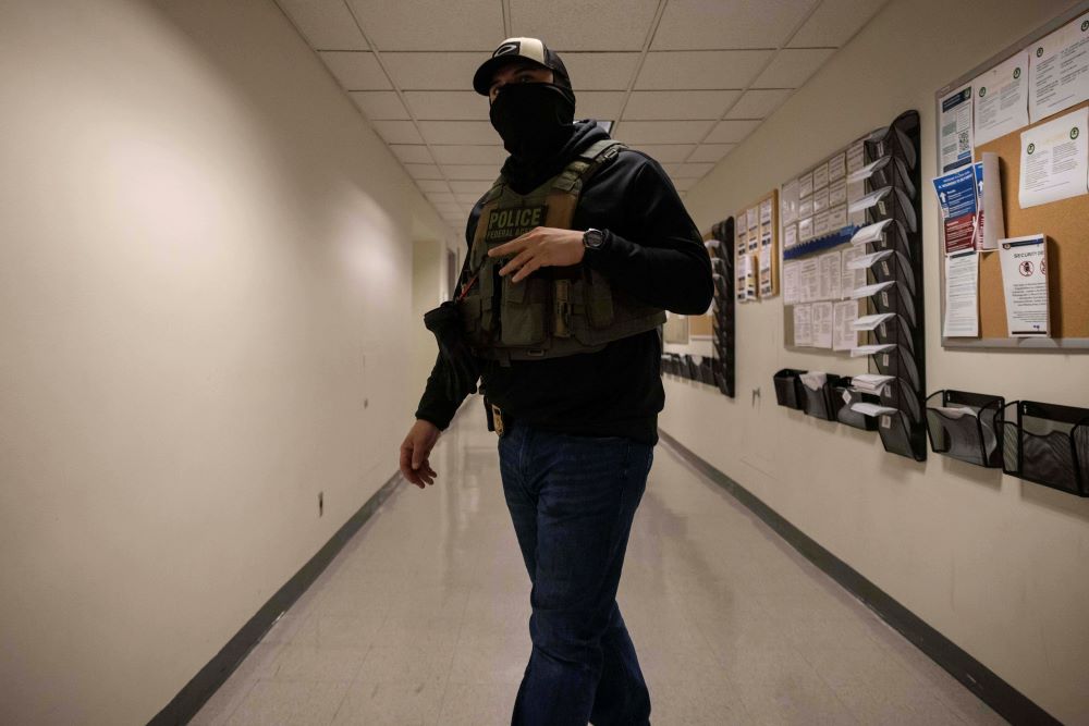A federal agent walks around at the immigration court at Jacob K. Javits Federal Building in New York. A federal agent walks around at the immigration court at Jacob K. Javits Federal Building in New York.
