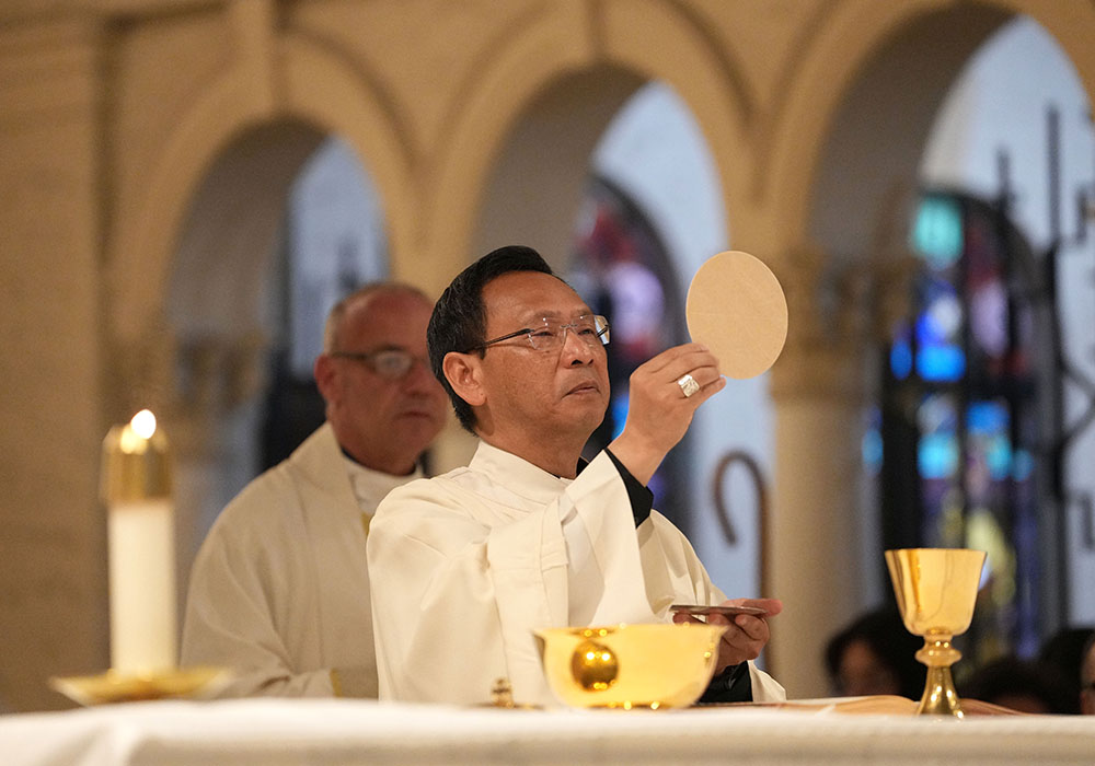 San Diego Bishop-designate Michael Pham celebrates Mass at St. Joseph Cathedral in downtown San Diego before heading to the federal building. (Chris Stone)